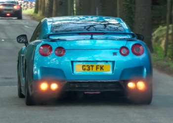 Supercars Speed Away: Wild Exit from Enthusiast Gathering