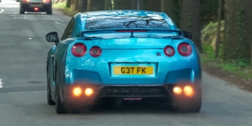 Supercars Speed Away: Wild Exit from Enthusiast Gathering