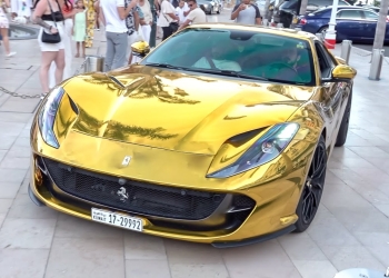 812 Superfast: Golden Ferrari V12 Roars Through Streets