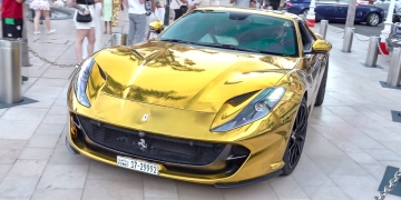 812 Superfast: Golden Ferrari V12 Roars Through Streets